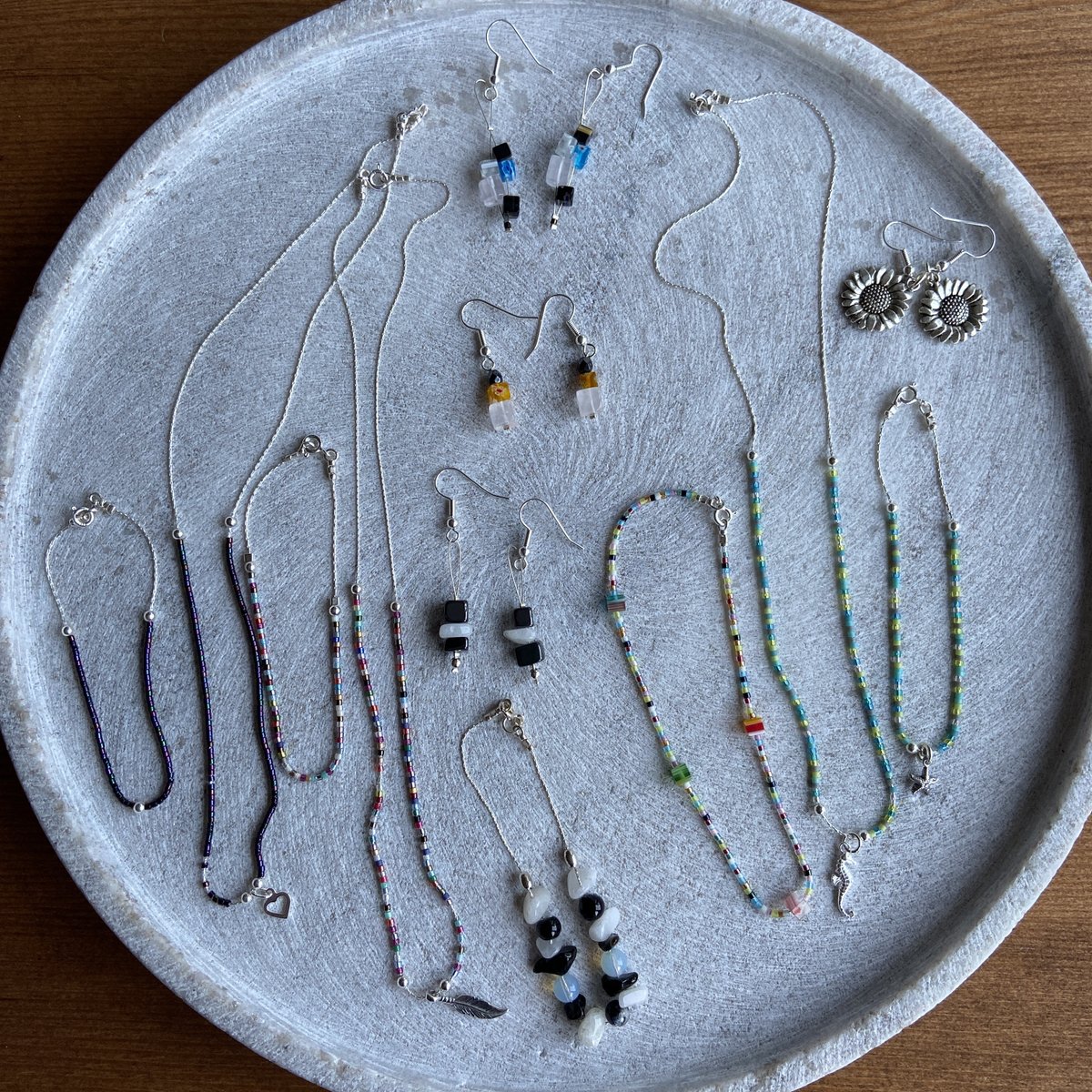 CGoodacres's tweet photo. Both Milly and Nikoline have turned their hands to jewelry making as part of their #lockdownskillup! This all looks fantastic, girls. #GoodacresFamily #collathome https://t.co/J9a1aSOviS