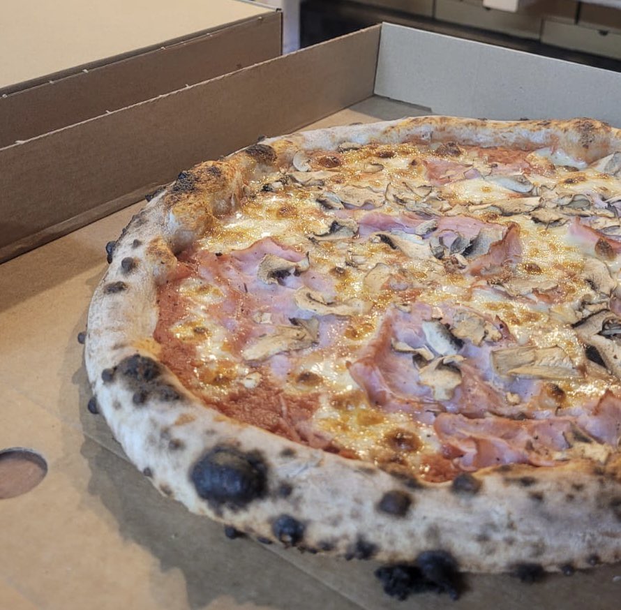 We are back again from 5pm on <a href="/ubereats_uk/">Uber Eats UK</a> for deliveries and ottolichfield.square.site for those who prefer to collect. Here’s a delivery being prepared last night. Our Pizza 3 - Home cooked ham, mushroom and Fior di latte mozzarella 🍕🍕🍕