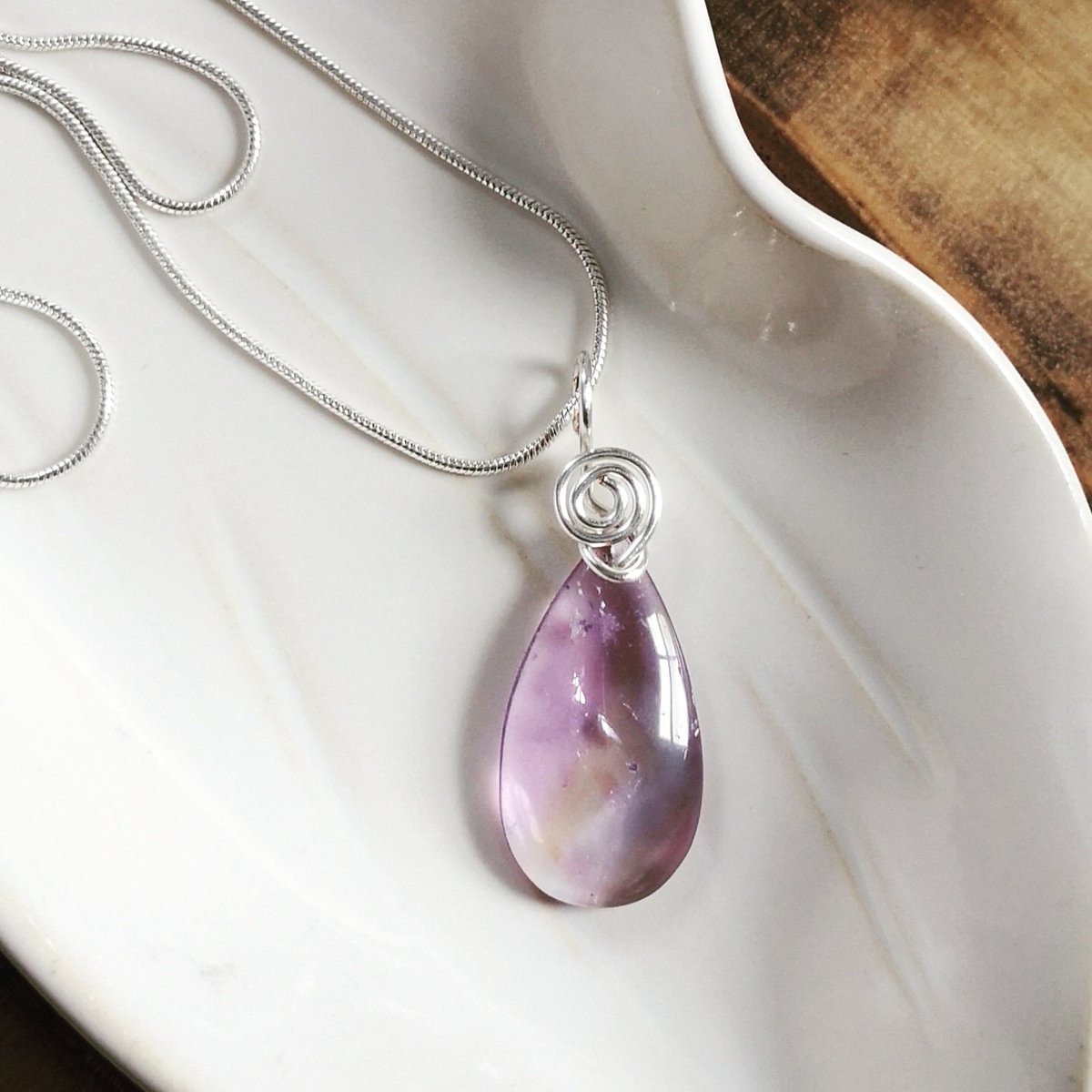 Oh so tender... Loving this delicate #ametrine pendant with wire wrapped bale. #healingcrystals  #healingjewellery  #shopcanadian  #shopstcatharines  #shoplocal  #shopSTC #artisanjewelry