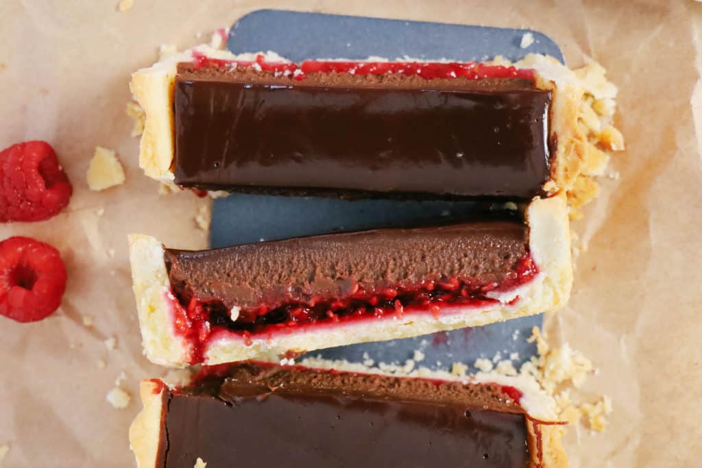 TaraNoland's tweet photo. This Delicious Chocolate Tart w/Raspberries is a perfectly balanced recipe w/a rich #chocolate ganache and a #raspberry jam on a buttery crust. Thanks to Melanie from @bonappeteat for this mouthwatering recipe! #chocolatetart #tart #dessert #ValentinesDay https://t.co/9wKmmR7Vjv https://t.co/HiKAFmlBVR