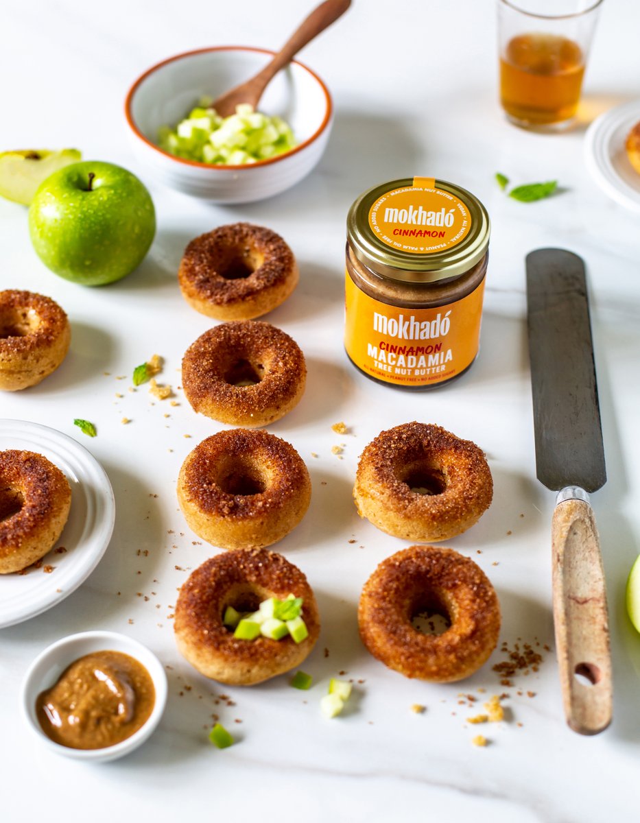 Mokhado's tweet photo. Celebrate the last wintery days of Veganuary with these baked (not fried) vegan apple cider cake donuts dusted in cinnamon sugar. 

Our Cinnamon Macadamia Nut Butter brings the perfect texture and spiced flavour. The super simple recipe is on the blog now: https://t.co/Cq8h7RkrtV https://t.co/8Y4N1gFVca