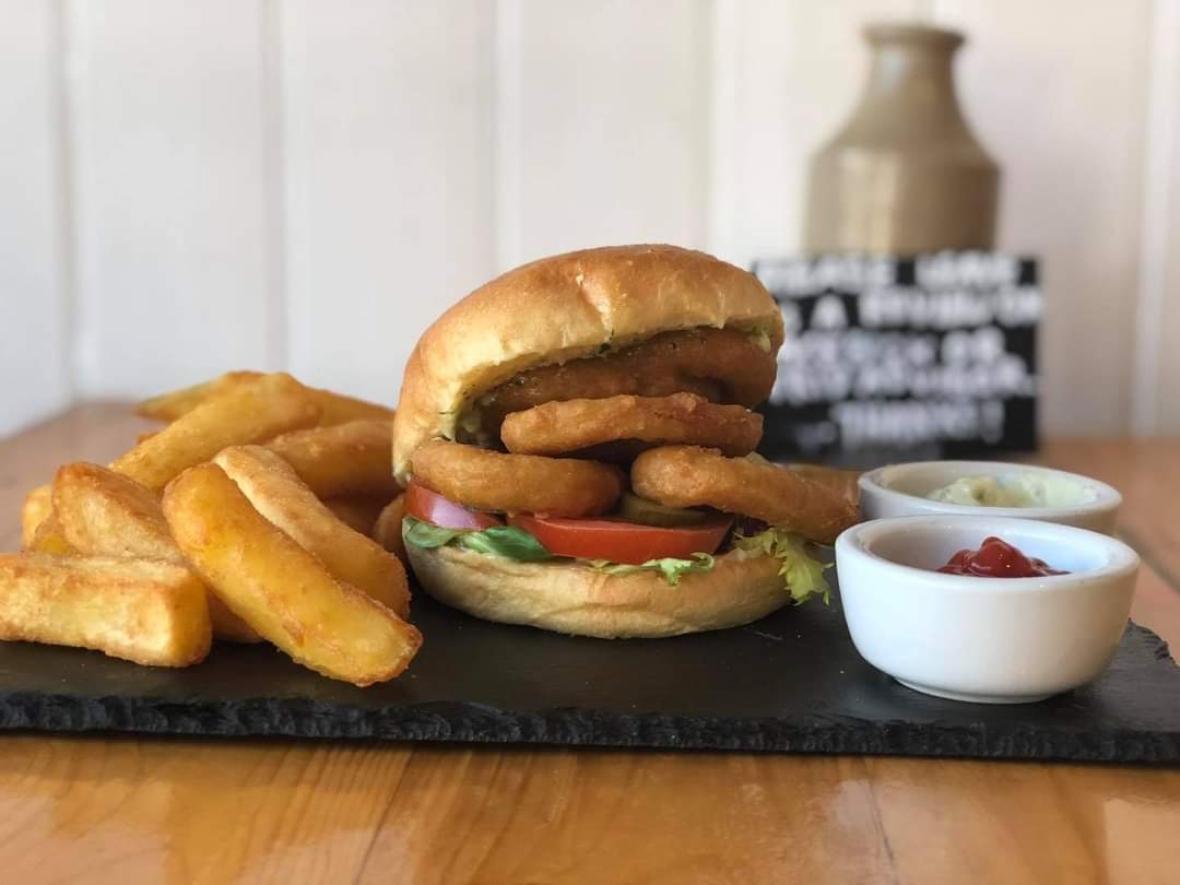 The juicy Calamari Burger, one of our best sellers. Have you tried it yet? 

Open tonight from 5pm 👍

#takeaway #cambs #burgers #foodies