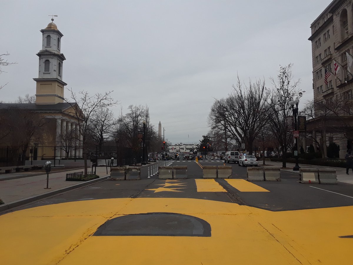 BUwashington's tweet photo. The (quiet) scene at BLM Plaza earlier this week. The fencing around Lafayette Park is still up, but only for a bit longer. #DCHistory #BUDC https://t.co/7xLcg7oMyk