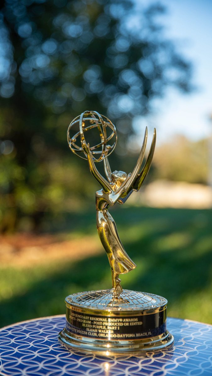 WalkerE_'s tweet photo. We won an Emmy. 'Bleed Purple' Directed and Edited @derekcody 
Producer @jennyachiu 
Cinematography @derekcody myself, and #TwitterlessDaniel https://t.co/gim9yxFuCV