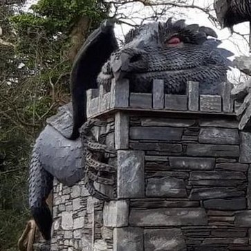 FabulousWeird's tweet photo. The entrance of a new house being built in Belfast, N. Ireland. Dragons are completely handmade. https://t.co/woLp3tOCL1