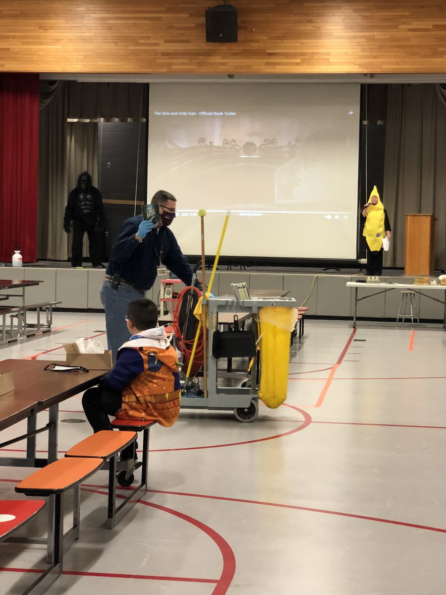 MissSeip's tweet photo. Ivan, his banana, and George helped get us excited for Kernsville Reads Together today! My kids and I are so excited to read such an awesome book and celebrate Ivan all month long! @KVCoyotes https://t.co/AHfrg6MvTs