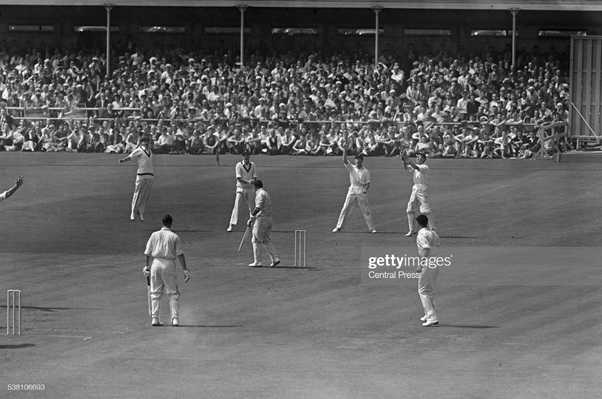 At 147 for 2, England is on top. Goddard runs in, keeping it tight. Insole tries to force him off the backfoot, edges and he is magnificently caught left-handed at slip. The catcher? That man again. Tayfield.