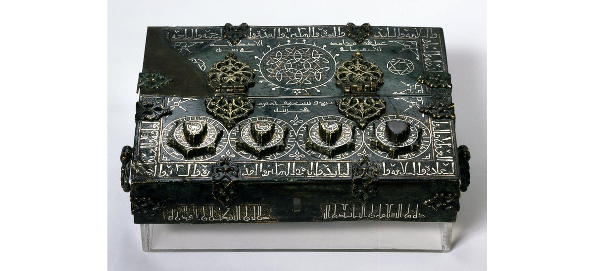 Fragment of a Seljuk box with a combination lock, cast and hammered brass, inlaid with silver and copper. from Iran, Ishafan, 1200-1201. Part of the David collection in Copenhagen.