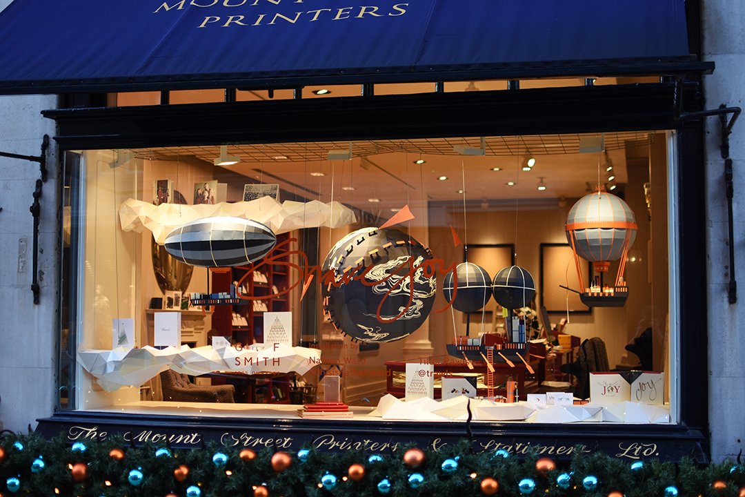 Nathan Ward and Tilda Rawls' bespoke paper craft, winter window display at <a href="/MountStPrinters/">MountStreetPrinters</a>.