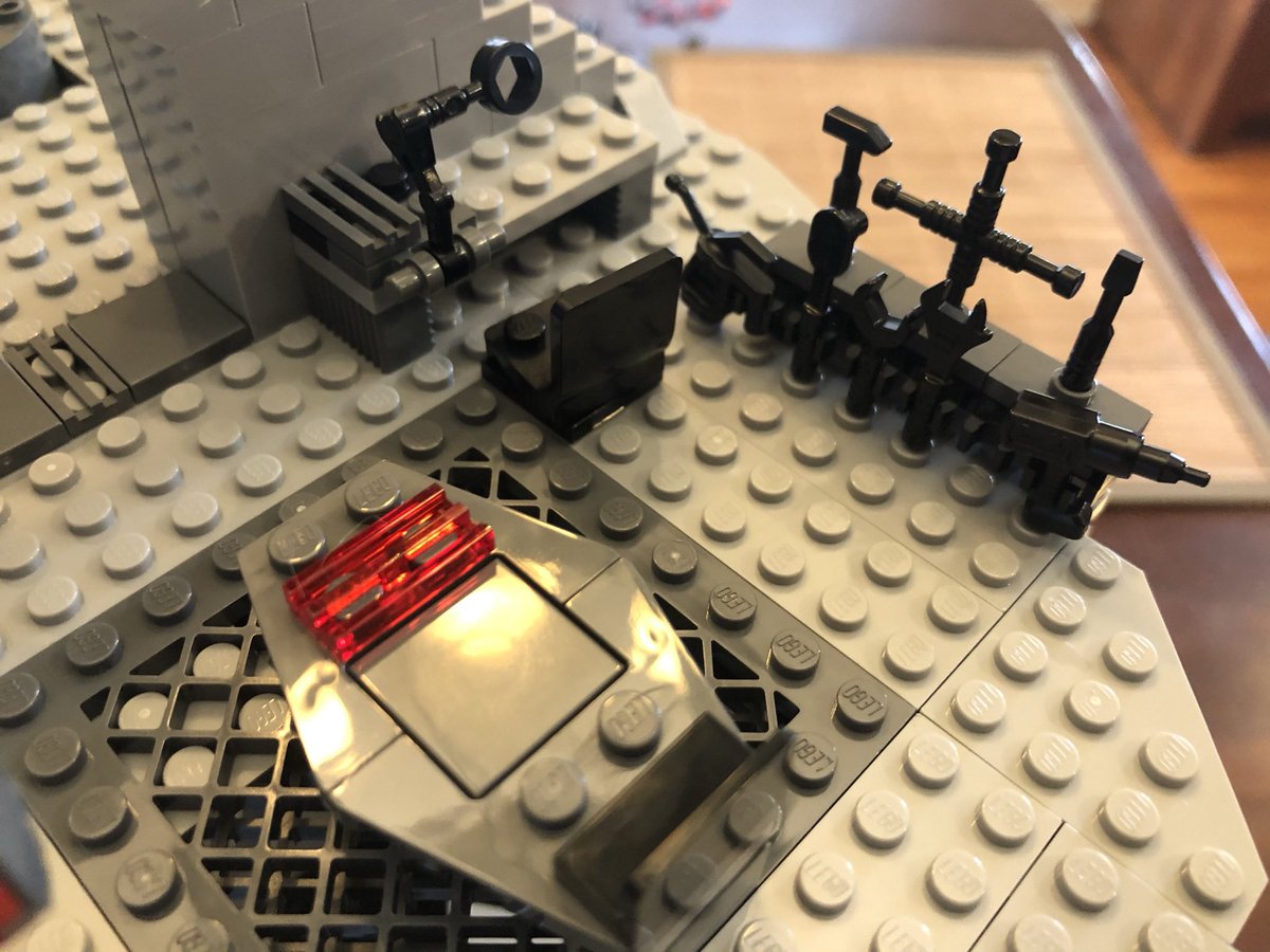 The elevator control room is also the droid shop. This little segment becomes a tool holder, the desk has a magnifying glass, there’s a parts bin by the elevator control, and a workbench in the middle.  #LEGO  