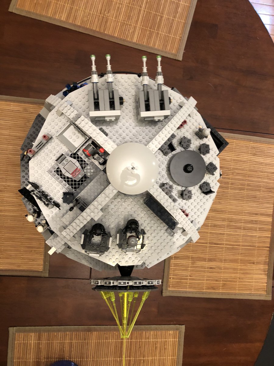 The Death Star is complete! Here’s a picture from above, and the side, and the temporary table made of lego boxes in my office, till I get a table In the 1st photo, bottom, you can see the two seats above the laser, the right one controls the aim and tilt.  #LEGO  