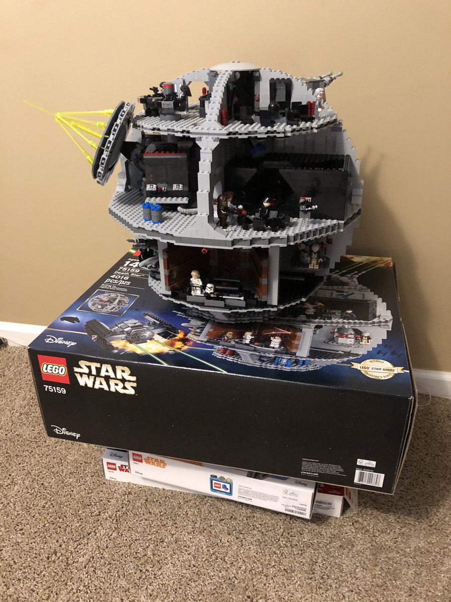 The Death Star is complete! Here’s a picture from above, and the side, and the temporary table made of lego boxes in my office, till I get a table In the 1st photo, bottom, you can see the two seats above the laser, the right one controls the aim and tilt.  #LEGO  