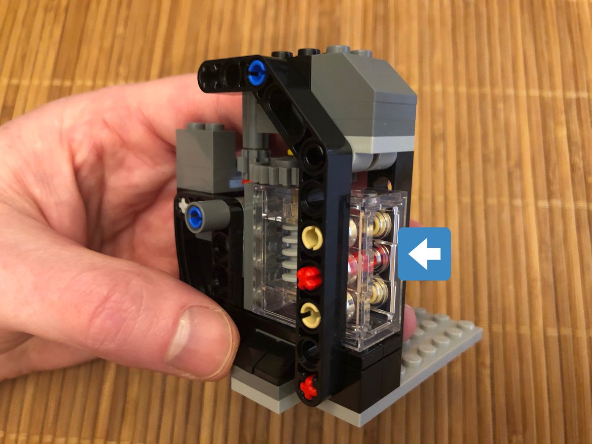 ...attach it to the base. Here’s where I missed something - a large gear is secured with the red axle in the second photo. Taking it apart 20 steps later was not easy. This angle bracket rotates freely.  #LEGO  