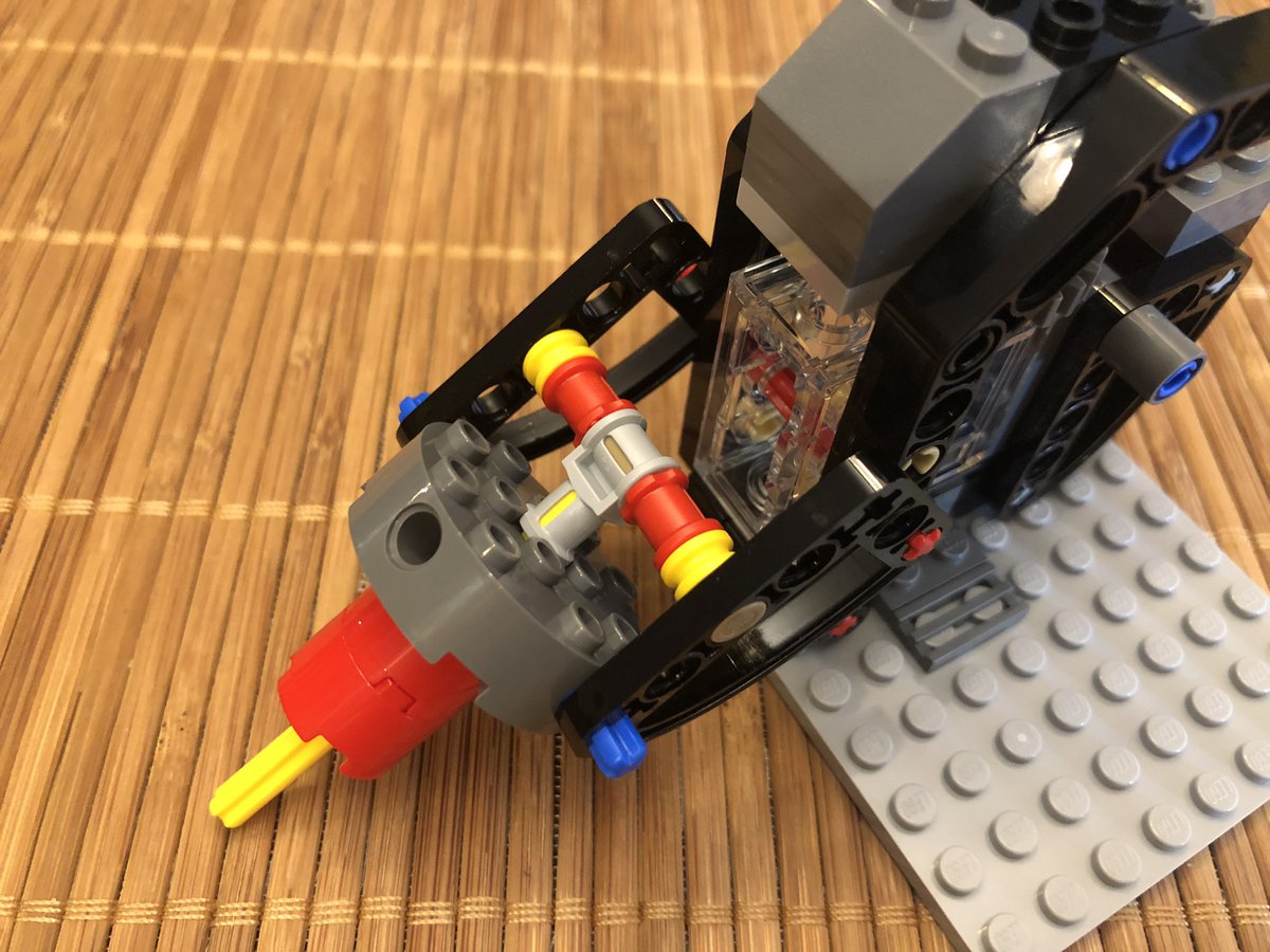 This sub assembly gets built on another angle bracket, and is then attached to the base. You can see it kind of saga, cause I forgot that gear Below the unit goes some control consoles and a giant switch.  #LEGO  