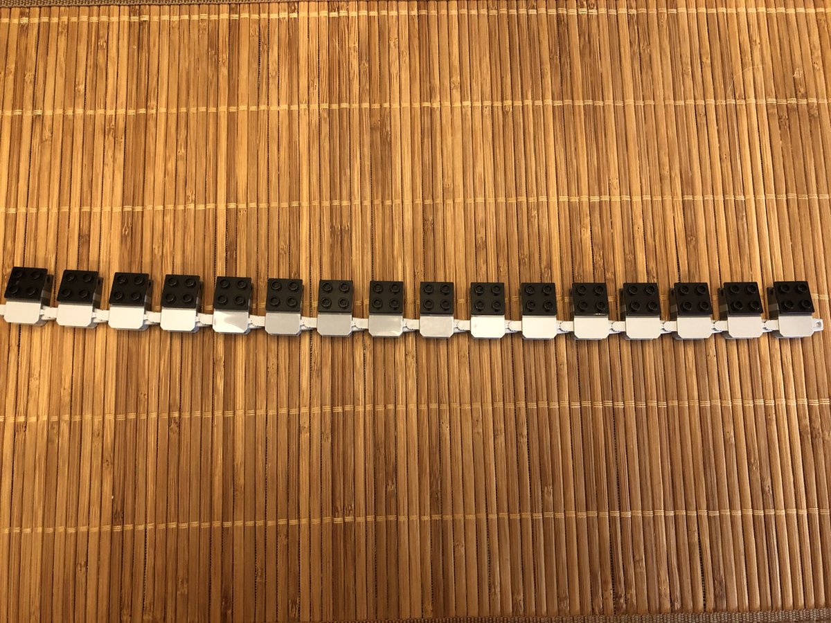 This part kind of sucks. This chain of 16 assemblies takes a while and it’s small pieces with sharp corners. Then these plates go on the black tilting plate. Make sure they point downward, or you’ll have to flip em around like me, then link them in a circle.  #LEGO  