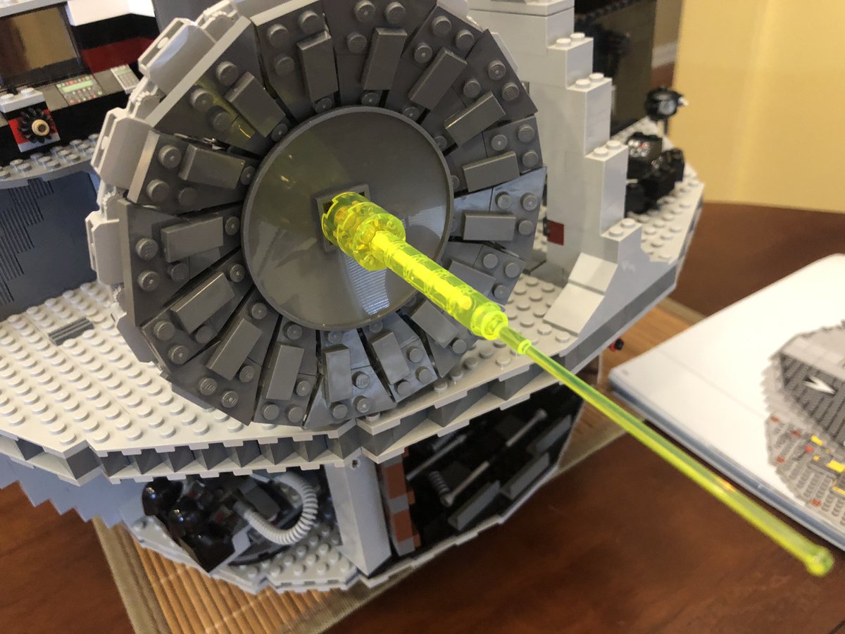 A few curved dishes go on the front and back, then it attaches to the aiming station. A green see-thru laser beam gives us the Death Star’s most famous weapon, it’s planet buster!  #LEGO  