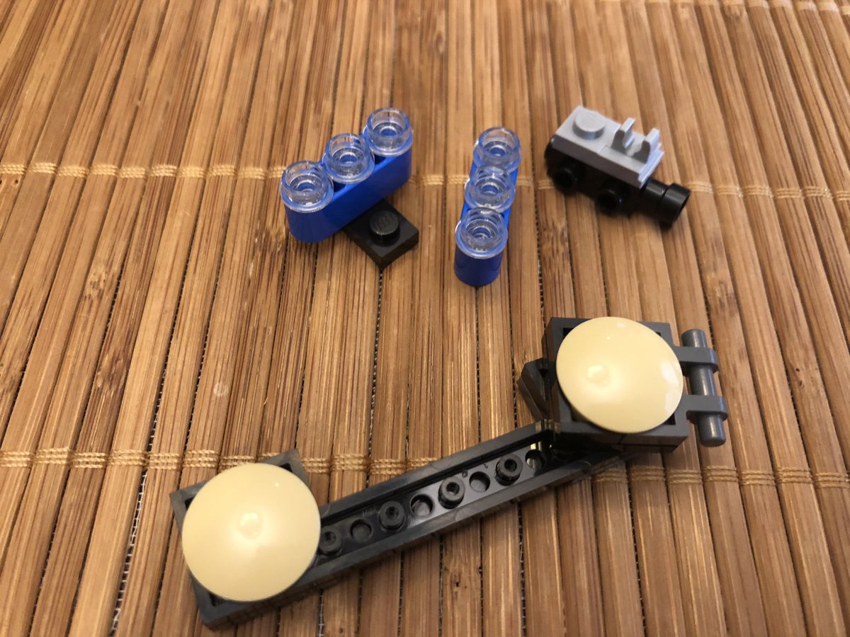The next section is solid, and it gets 7 rotating plates on top. Underneath is this weird assembly, which rotates in two places (under the rounded plates)  #LEGO  