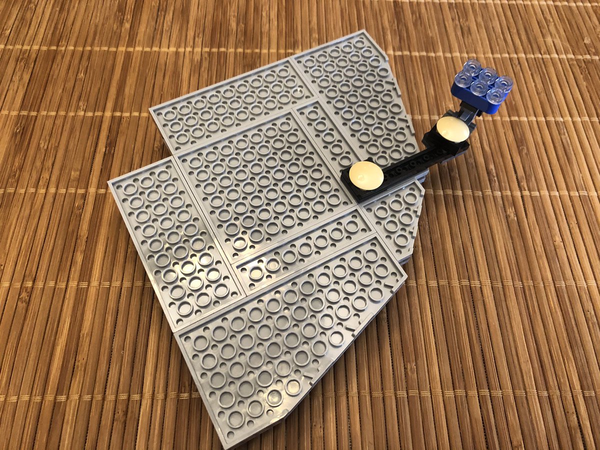 The next section is solid, and it gets 7 rotating plates on top. Underneath is this weird assembly, which rotates in two places (under the rounded plates)  #LEGO  