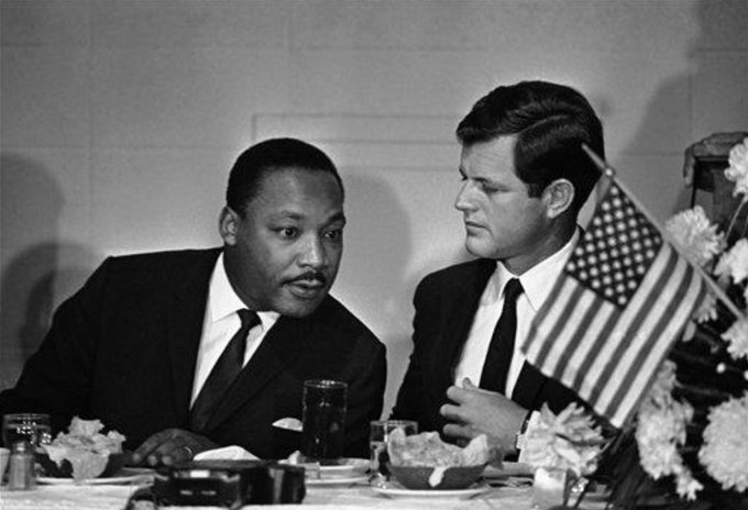 Martin Luther King, Jr. (left) and Ted Kennedy at the Southern Christian Leadership Conference banquet in Jackson, Mississippi on August 8 in 1966. Photo credit: AP.  #MLK    #MLKDay    #MLKDay2021  