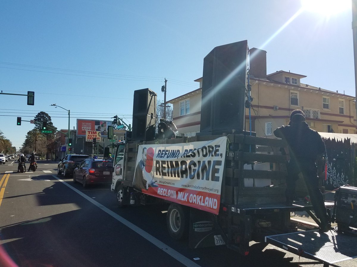Caravan turns toward East Oakland on E14th Street while surviving family members give testimonials about police executing their loved ones experiencing mental health crises.  #MLKDay2021    #Oakland