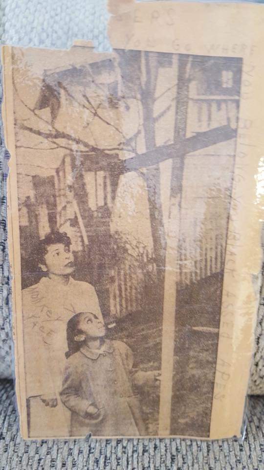 In 1957... just one year before he became the HC at Charleston High the KKK burned a cross in their front yard. This newspaper clipping about it that we possess was delivered to them with the handwritten note full of racial slurs.