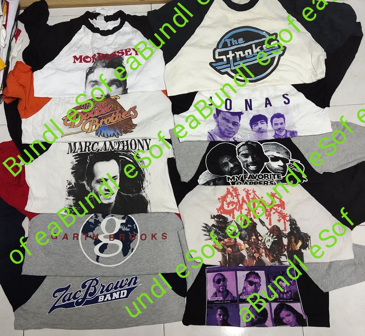 sofeabundle's tweet photo. new haul today... 
#morrisey #thestrokes #MarcAnthony #thedoobiebrothers #JonasBrothers #garthbrooks #zacbrownband #gwar #tupac #hiphopartist #sofeabundle #raglan #3quarter https://t.co/YEsfzYebg7