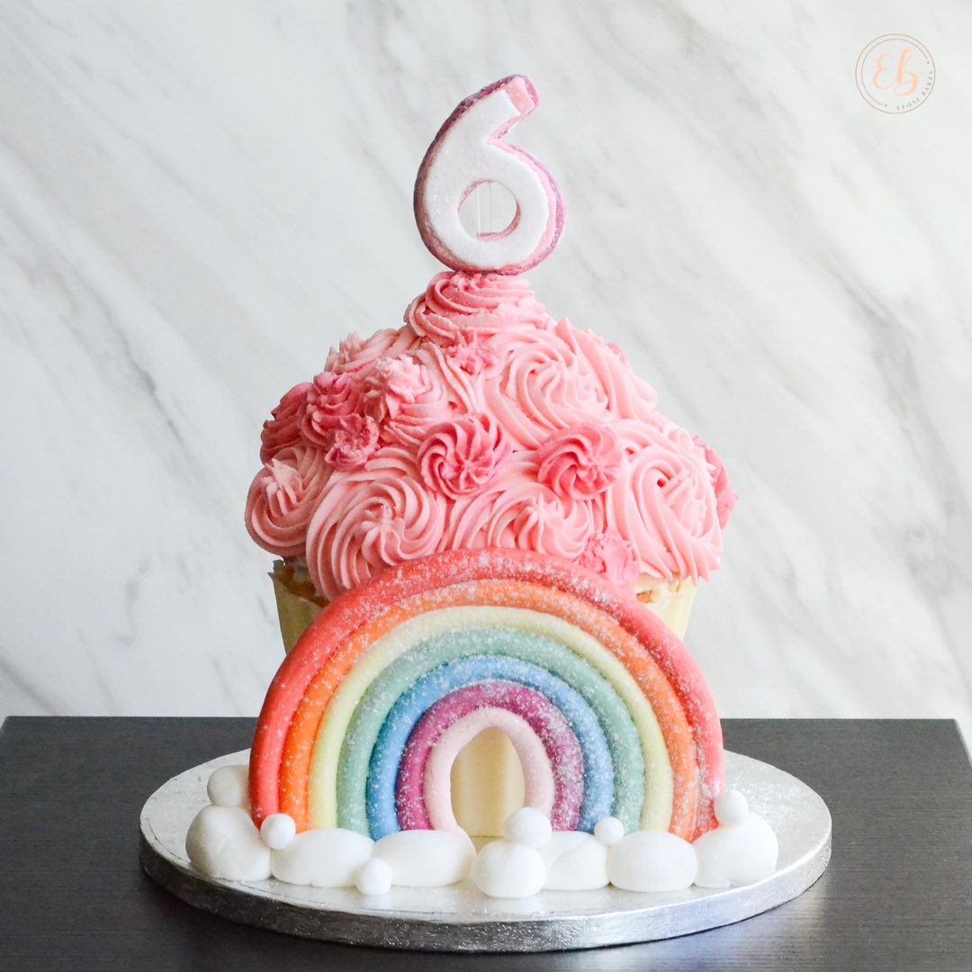 efosibakes's tweet photo. A giant cupcake rainbow cake for my little sister’s birthday. This was so fun to make and my first proper time using fondant. How did I do? 🌈

 #baker #londonbaker #selftaughtbaker #cakes #homemadecakes #efosibakes #blackbusiness #smallbusinesses https://t.co/gSSXXXtRNi