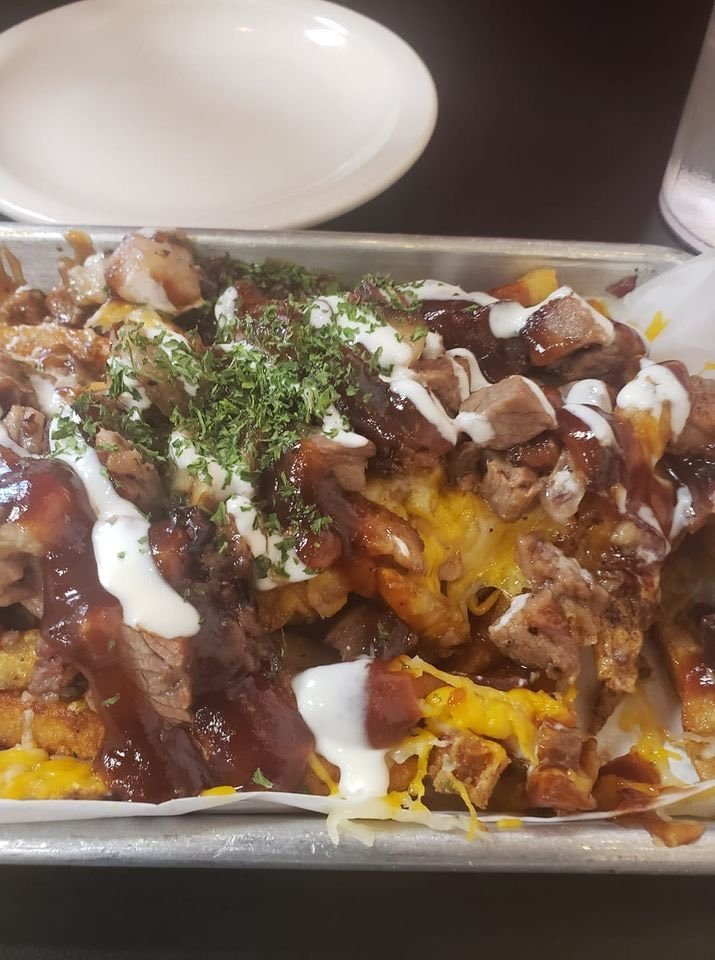 Most of the food the restaurant advertises looks like vomit on a plate, vomit in a bread bowl, or vomit with fries.