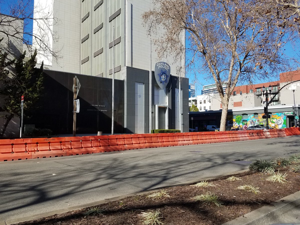 Caravan passing a fortified OPD headquarters, heading north on Broadway.  #DefundOPD