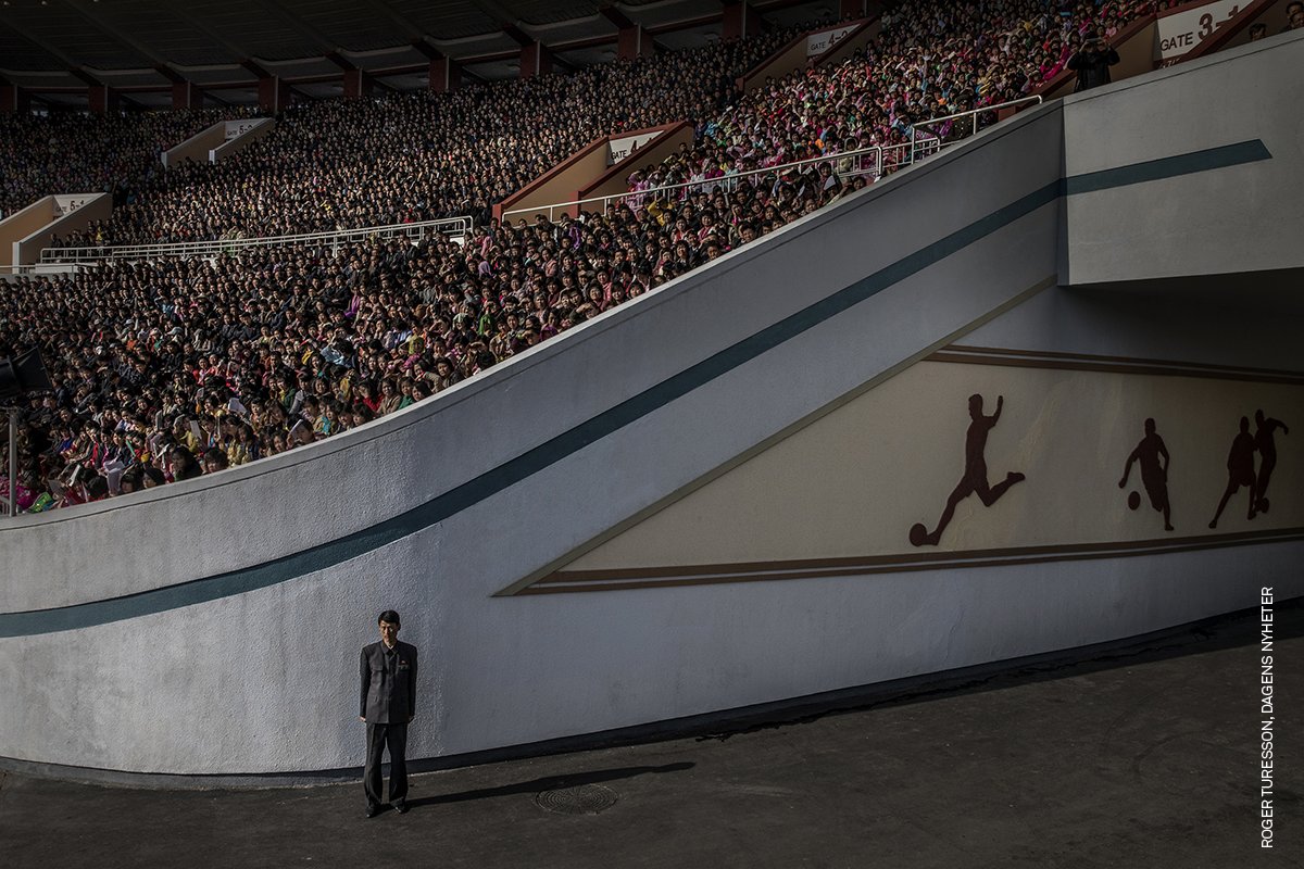 Photo of the Day | A crowd awaits the start of the Pyongyang Marathon at the Kim Il-sung Stadium in Pyongyang, North Korea, by Roger Turesson (<a href="/rogerturesson/">roger turesson</a>), for <a href="/dagensnyheter/">Dagens Nyheter</a>. Discover the #WPPh2018 awarded image: bit.ly/2M2goSs