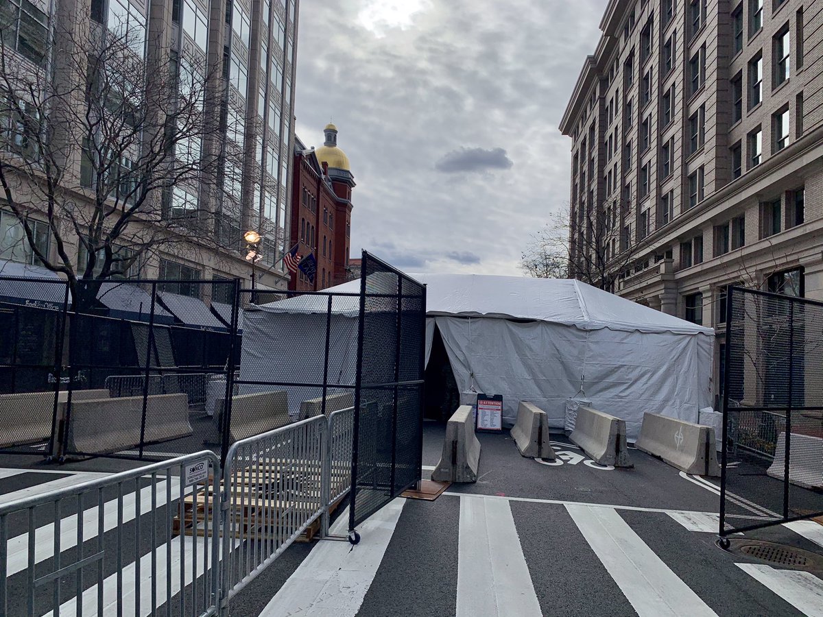 Many roads are blocked by gates and Jersey barriers, and have security tents to check any person who tries to pass through 18/