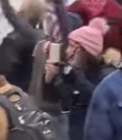 Prior to  #Bullhornlady arrival at the  #Archway she can be seen apparently alone. But she's not, she is live streaming at key rally points on the Lower Western Terrace. (Side note: so far each security point has fallen rapidly as they are manned by Capitol PD).