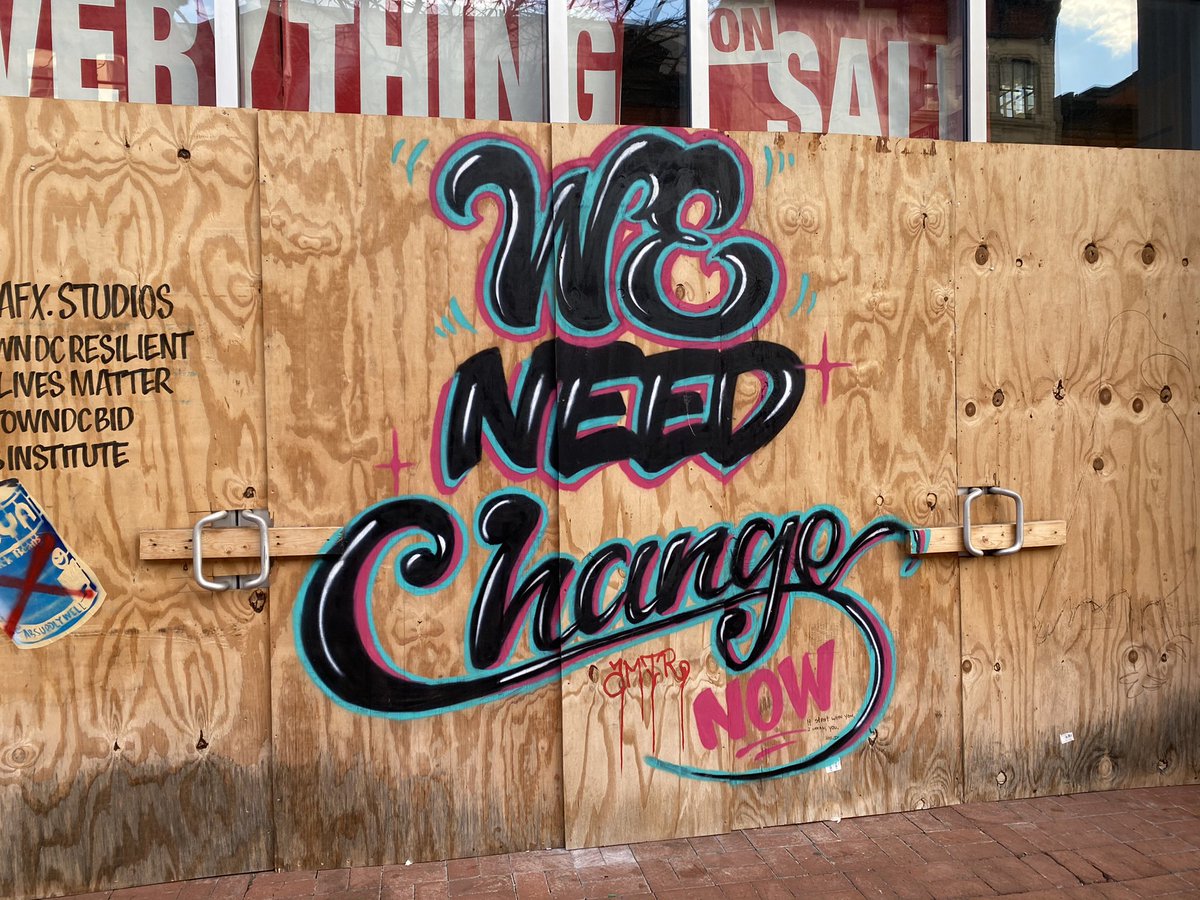 Several of the boarded businesses have different images and signs on them. See below: