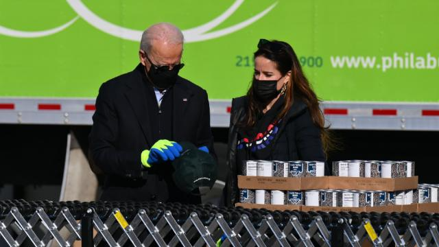thehill's tweet photo. Bidens load food boxes in Philadelphia on MLK day https://t.co/SsmjhOnOHd https://t.co/d9dp3PyIne