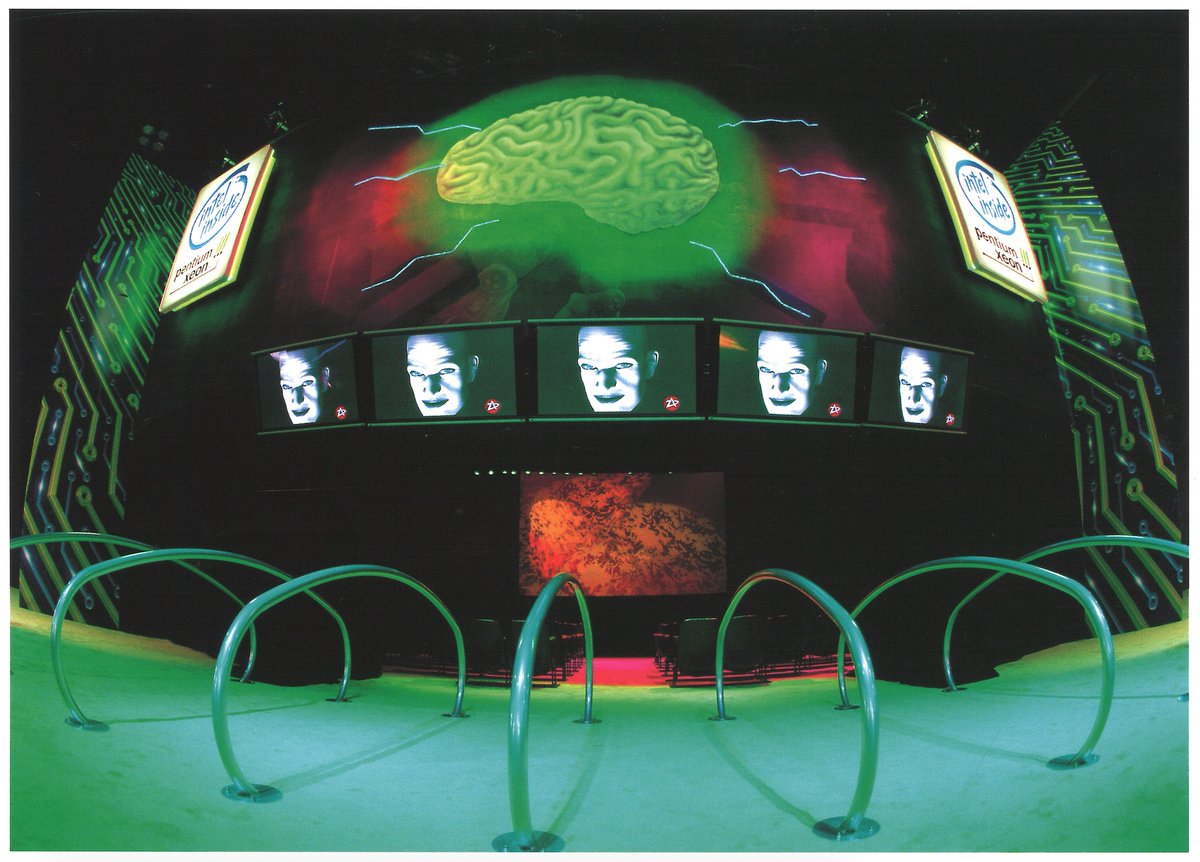 Examples of the Cyber Corporate style; including a giant glowing brain of Intel, rippling Pepsi supergraphic, and a strange Sony computer-clump cloud