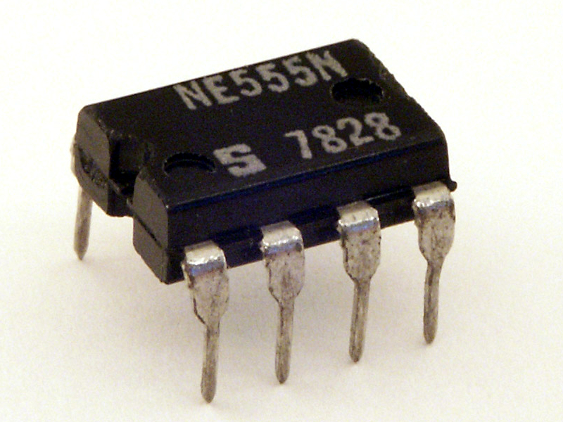 So imagine a chip like this. It's the 555 timer, which is one of the most popular integrated circuits ever made. In 2017, it was estimated a billion are made every year.