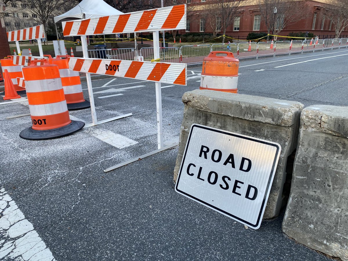 Fences, dump trucks and concrete barriers are all blocking the way to areas of the National Mall.