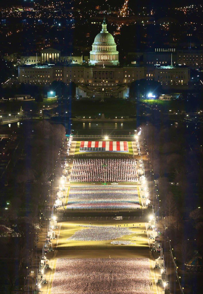 MeidasTouch's tweet photo. The National Mall looks stunning in advance of Joe Biden’s inauguration. The nearly 200,000 state and territory flags are a celebration of the nation’s diversity. https://t.co/7YSdTJ3AXy