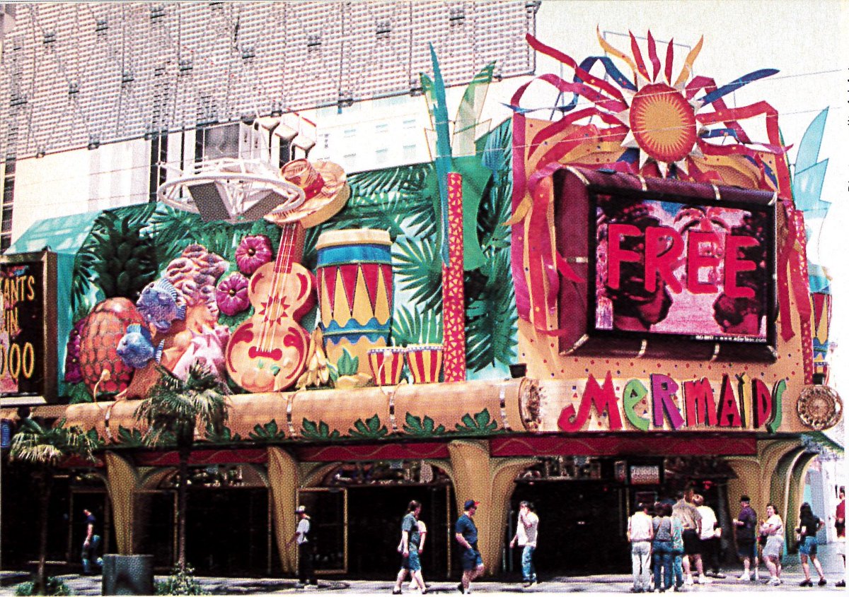 They've got a bunch from that peak of maximum-themed entertainment in the late 1990s. Luxor casino floor & Mermaids façade in Vegas, Port Discovery at Tokyo DisneySea, and one of those super-extravagant neon movie 'decoplexes' in Nashville