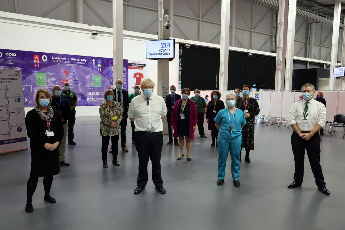 nbrisNHSdigital's tweet photo. If you’d said 12 months ago that some of our digital team would be lining up alongside the Prime Minister at Ashton Gate… Proud to be part of the mass vaccination effort, as seen by the PM last week (Phill Wade &amp; Dan Burns pictured with our local colleagues &amp; Boris Johnson). https://t.co/056hZN35ff
