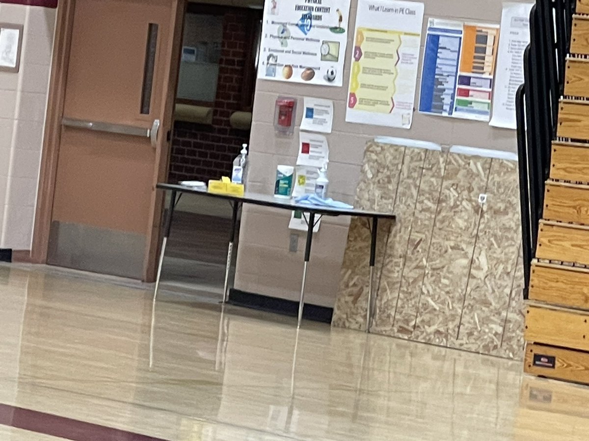 BrianHullPE's tweet photo. First day back with students in over 19 months. Have the gym setup for #shapereentry. Sanitation areas, live stream stations, sanitation supplies for when students leave my #physed class. It’ll be an adventure! https://t.co/fFbUDpQrex