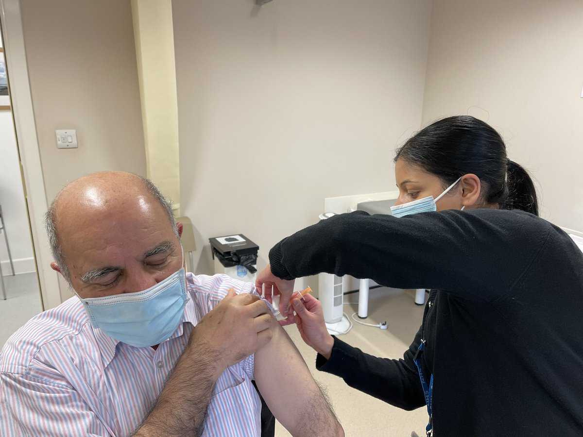SolihullRural's tweet photo. 3735 later...and the Solihull Rural team are going strong. Javid Hashmi-Tafreshi came for his first jab and was happy to pose! Great to see our PCN pharmacist Priya running the clinic 
@GPNKAM @vac_sol @NHSBSolCCG  @AmitDahya @MineshParbat @NikkiKF https://t.co/x1pyoVaphx