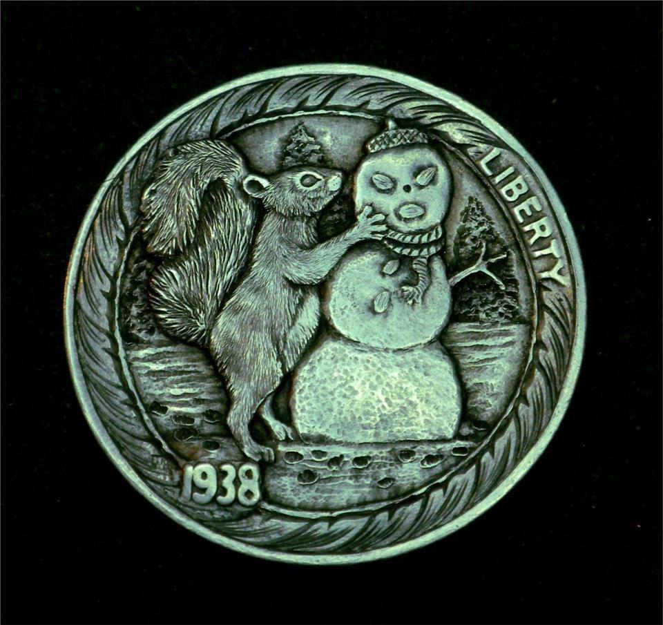 Hobo_Nickel_Soc's tweet photo. January 18 = #WorldDayOfTheSnowman #DayOfTheSnowman #WDoSM #Snowman fall from heaven unassembled. #HoboNickel #CoinCarvings by #HowardThomas @PurrgatoryCats https://t.co/ildfBWDw7m