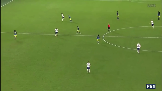So Macario wisely takes an additional touch, forcing the defender guarding Lloyd to let Lloyd go.