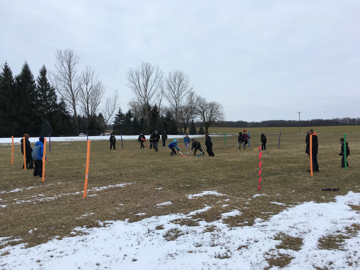 Matulisj's tweet photo. 4 sided hockey. Noodles on top of driveway markers for boundaries and goals #physed #getoutside #SHAPEPhysEd #shapemi https://t.co/WeajZkSqmv