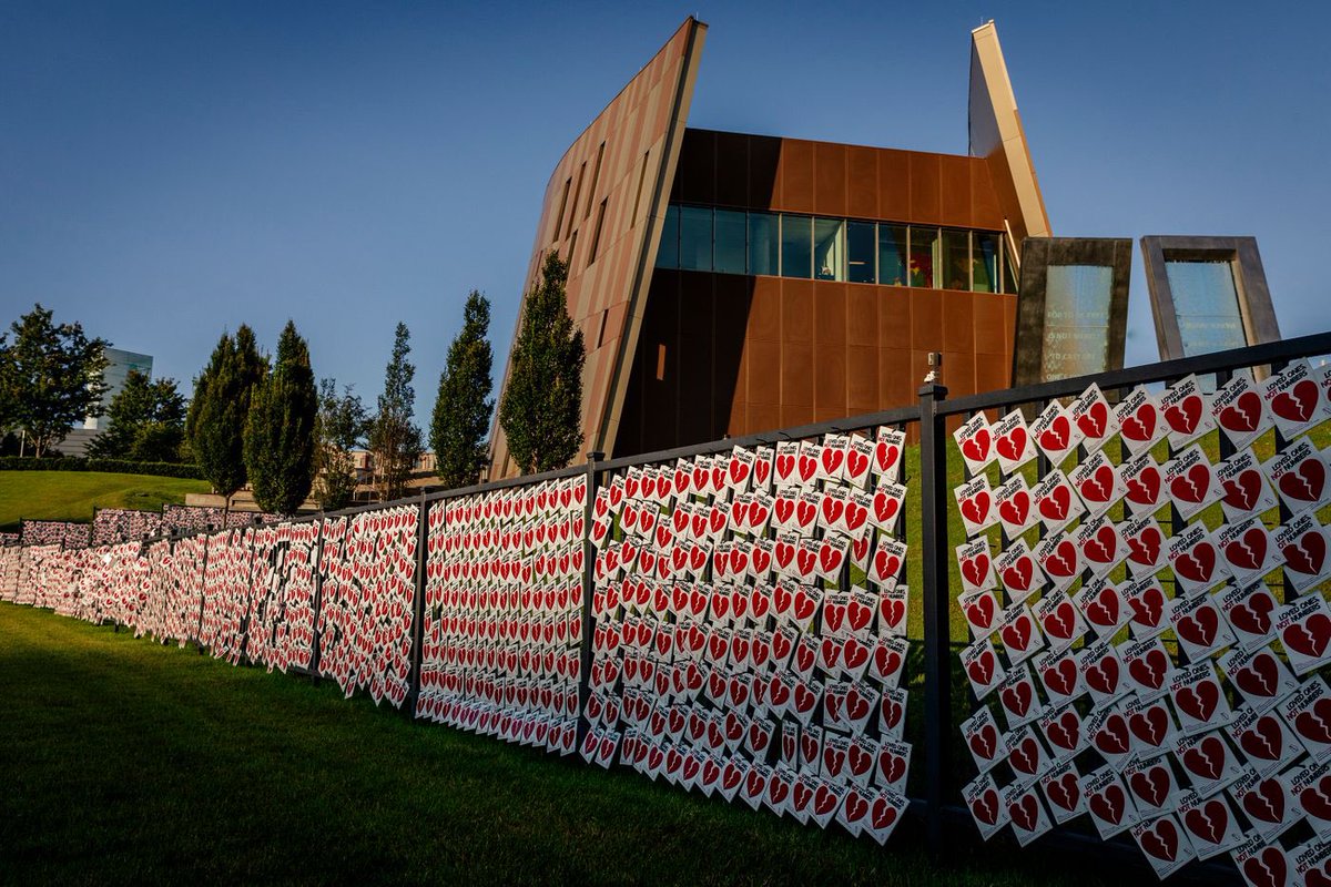 In Atlanta, Loved Ones, Not Numbers created a wall of hearts each representing a person who died from the virus, outside the National Center For Human Rights. : Audra Melton