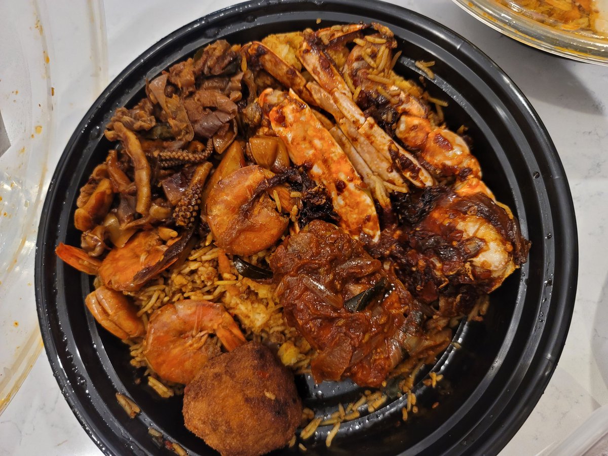 Nasi goreng anyone? Ordered food from <a href="/CuciniCatering/">CuciniCatering</a> and brought it with us to surprise my parents when we moved back in with them.
