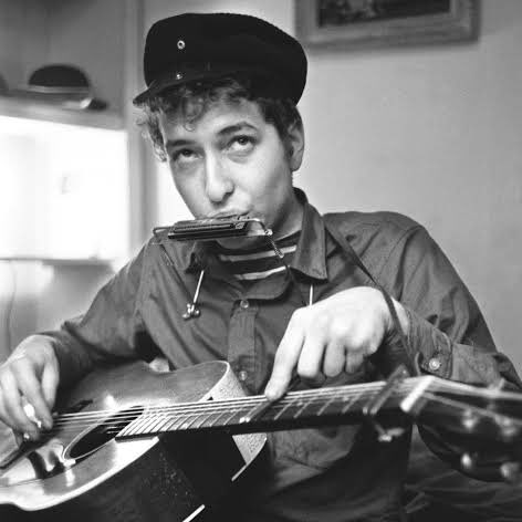 December 3, 2020 - Timothée posts a photo playing the harmonica taken sometime in August 2020!