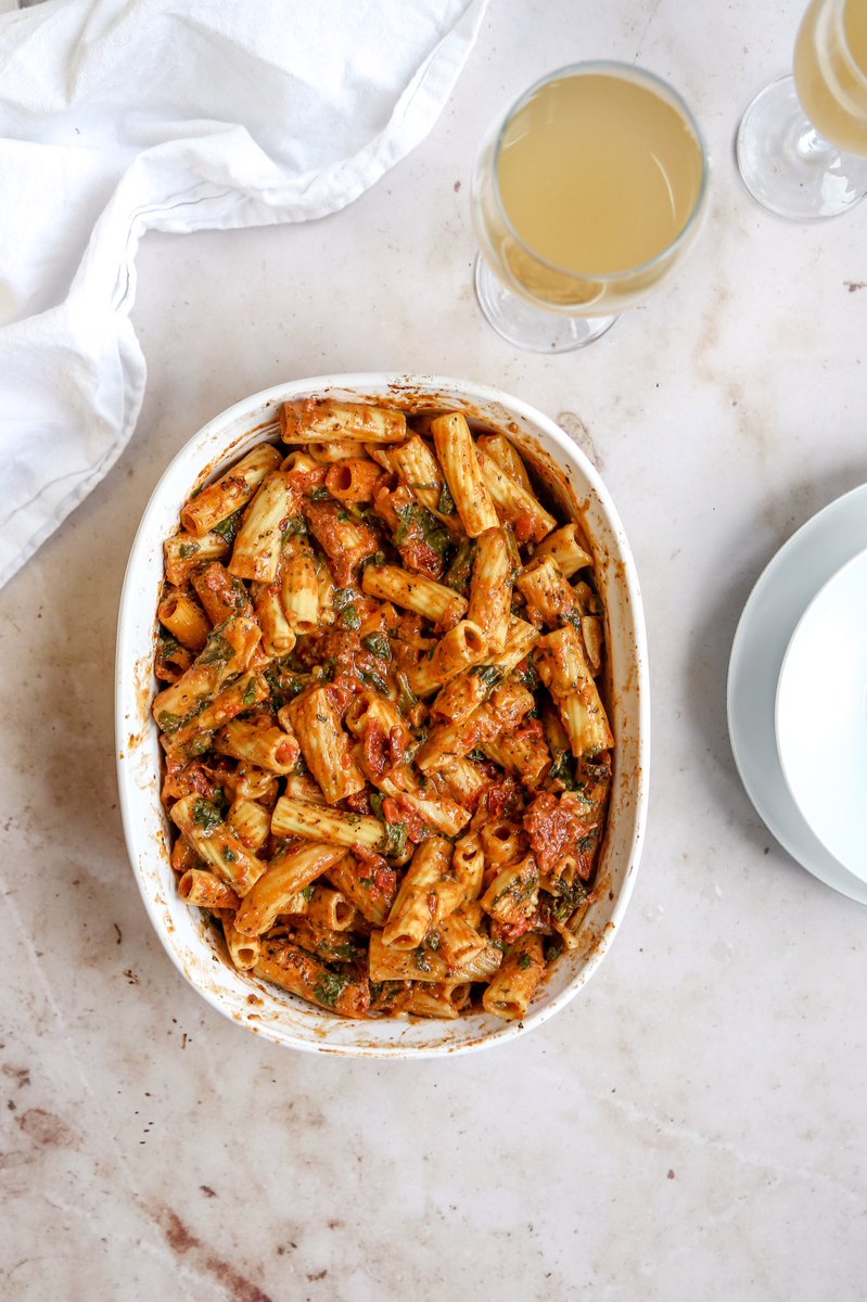 before baking vs after baking. 

ONE POT sun-dried tomato pasta bake. no need to pre-boil your pasta or make any sauce. EVERYTHING happens in your oven. #vegan