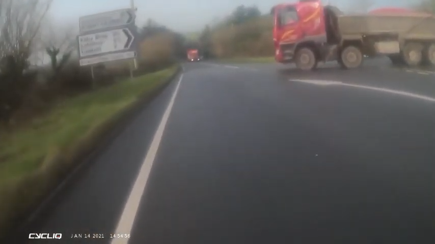 roadcc's tweet photo. Near Miss of the Day 523: Tipper truck driver pulls out in front of lorry and cyclist https://t.co/z4aTqZMCmE #cycling https://t.co/BnahXXsI4b